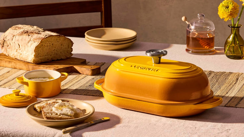 Le Creuset 11 1/2" (1 1/2 Qt.) Signature Enameled Cast Iron Oval Bread Oven w/Crucible SS Knob - Nectar