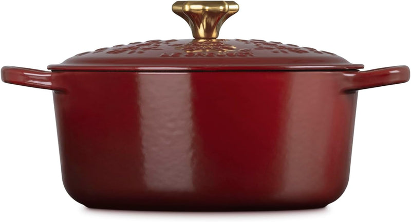 Le Creuset 4 1/2 Qt. Enameled Cast Iron Round Dutch Oven w/Tree Embossed Lid & Gold Star Knob - Garnet