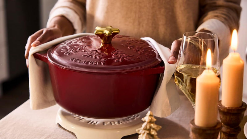 Le Creuset 4 1/2 Qt. Enameled Cast Iron Round Dutch Oven w/Tree Embossed Lid & Gold Star Knob - Garnet